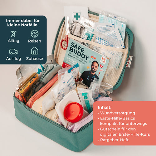 SafeBuddy Erste-Hilfe-Tasche geöffnet mit Inhalt – Wundversorgung, Erste-Hilfe-Basics, Gutschein für den Online-Kurs, Ratgeber-Heft